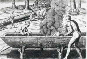 Indios construyendo canoas. Grabado de Theodore de Bry, c. 1590; dominio público.