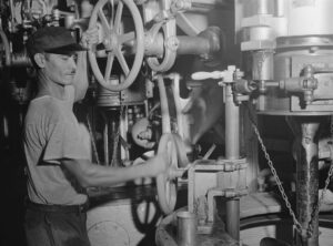 Untitled photo, possibly related to: Ensenada, Puerto Rico. A workman in the mill of the South Puerto Rico Sugar Company. Jack Delano. Jan. 1942. Call Number: LC-USF34- 047895-D [P&P] (This image in a jacket marked "Killed.")